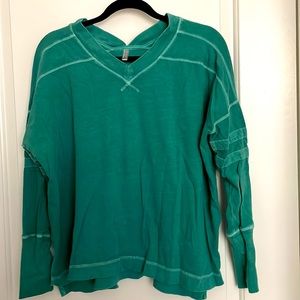 Free people movement, long sleeve, emerald green shirt. Size xs.